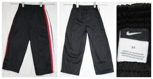 Nike Trainingshose 2T Kleinkind sportlich rot schwarz weiß Taschen elastisch zum Überziehen gebraucht, in einwandfreiem Zustand - Bild 1 von 1