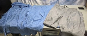 đ„ Ensemble survĂȘtement footlocker nylon annĂ©es 90 veste bleue pantalon bleu et gris taille L - Photo 1/24