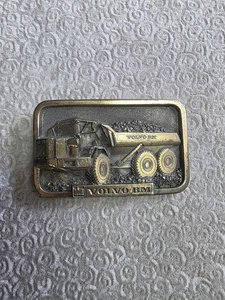 Hebilla de cinturón vintage VME Volvo BM Michigan maquinaria pesada minería - Imagen 1 de 3