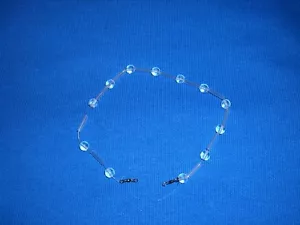 SPECIALE TROTA CORONCINA IN VETRO CON SFERE 3 GR PER TREMARELLA STRISCIO VETRINO - Foto 1 di 1