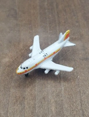 Vintage 1987 Micro Machines Boeing 747 United Passenger Airplane - Image 1 of 2