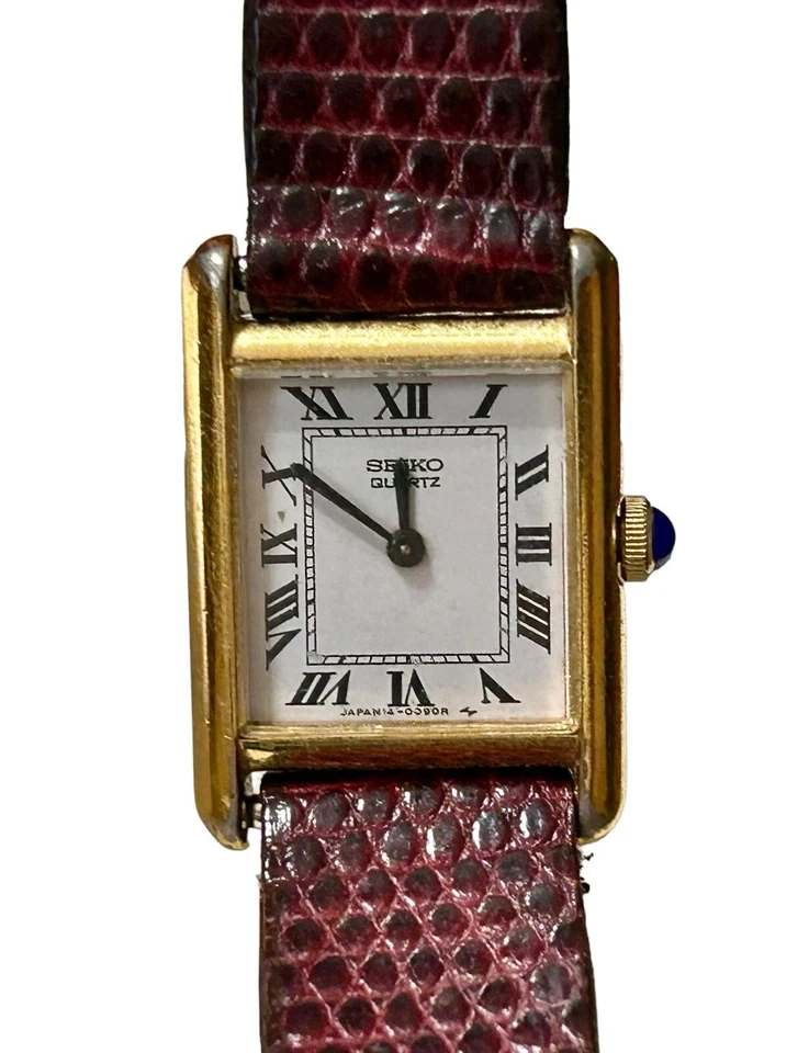 Reloj Seiko Tank con correa de cuero MOVADO tono dorado Foto 1 de 4