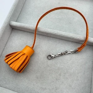 HERMES Carmencita Charm Orange Leder Unisex Silber Hardware Mini Quaste Japan - Bild 1 von 9