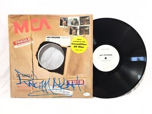 Disco de vinilo firmado por Rakim en el gueto certificado de autenticidad JSA - Imagen 1 de 2