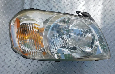 05 06 Faro derecho derecho Mazda Tribute lado pasajero Foto 1 de 4