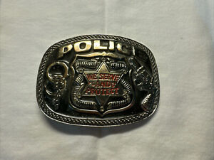 VINTAGE POLICE "WE SERVE and PROTECT" BELT BUCKLE w Revolver Gun Handcuffs
