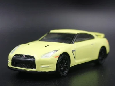 Modello Auto Diecast Diorama In Scala 1:64 NISSAN SKYLINE GTR R35 NEON 2007-2025 - Immagine 1 di 4