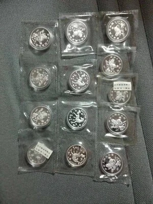 14pc 1997 china unicorn 5yuan 20g silver Coin - image 1 of 3