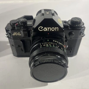 CANON A-1 SLR 35mm Film Camera w/ 50mm f/1.4 Canon S.S.C. Lens - Tested - Great - Picture 1 of 11