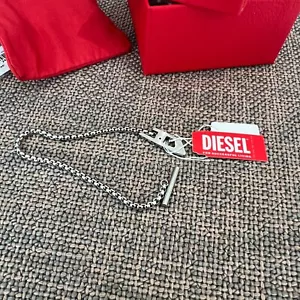 Pulsera de cadena de acero inoxidable Diesel Dx1476 plateada DX1476 100% auténtica - Imagen 1 de 12