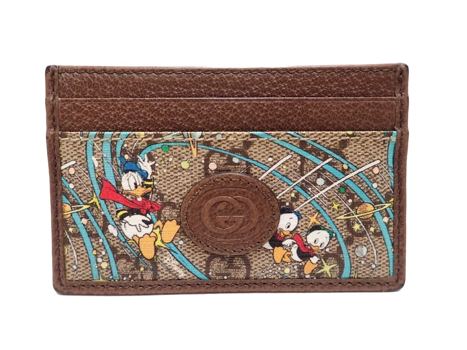 Porta-cartões GUCCI Disney Supreme GG lona Pato Donald - Imagem 1 de 4