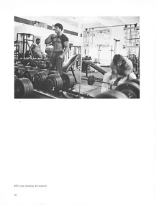 1970s Bodybuilder Lifts shirt to Reveal Pecs - Picture 1 of 1
