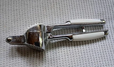 Pedrini Self Cleaning Stainless Steel White Handle Garlic Press - Italy - Image 1 of 4