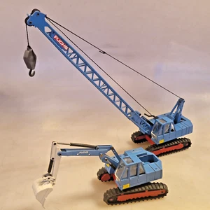 NZG Fuchs 118 grúa de mástil de rejilla y excavadora con cadenas de goma Diecast modelo publicitario 1:50 - Imagen 1 de 15