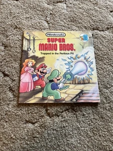 Nintendo Super Mario Bros. Trapped In Perilous Pit Book 1989 - Bild 1 von 3