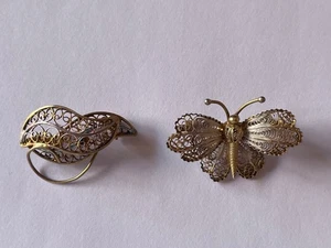 Due piccole spille vintage in argento 800 dorato anni '20-'30 - Foto 1 di 9