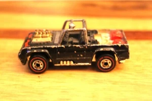 Rara Red Line Hot Wheel Minica Baja Bruiser 1973 pressofusa nera - Foto 1 di 12