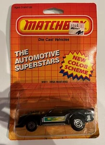 MATCHBOX IMSA Mustang MB11 schwarz NEU in BP MACAO 1986 - Bild 1 von 4