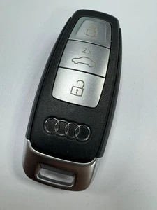 LLAVERO INTELIGENTE ORIGINAL AUDI 3 BOTONES REMOTO PROBADO Y FUNCIONANDO 8Y0959754AP - Imagen 1 de 4