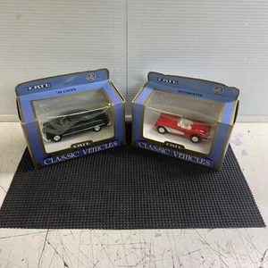 2) ERTL Veicoli Classici 1949 COUPE (1989) & 1960 CORVETTE (1988) Scala 1:43 NUOVO! - Foto 1 di 7