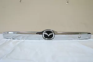 2001 02 03 04 06 Mazda Tribute tapa maletero licencia moldura cromo OEM # EC 0150810 - Imagen 1 de 4