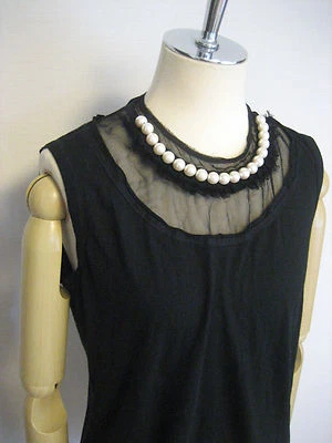 Camisetas sin mangas Comme Des Garcons en capas transparentes bisutería AD2006 Foto 1 de 4