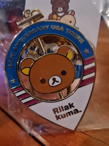 Rilakkuma 20th Anniversary USA Tour Exclusive Spinning Enamel Keychain Cover