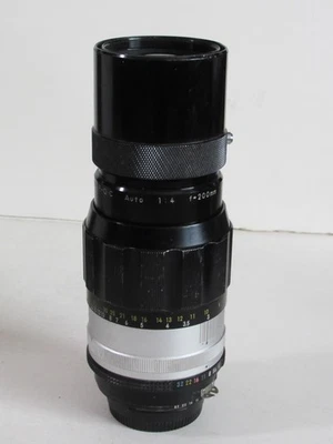 Teleobjetivo Nikkor-Q automático 1:4 f=200 mm Nikon625674 - Algo suelto en el interior Foto 1 de 4
