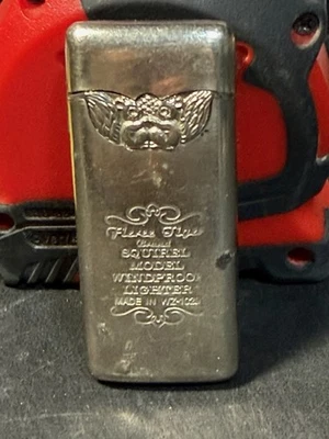 Encendedor a prueba de viento modelo ardilla marca Tiger vintage sin probar LEER Foto 1 de 4