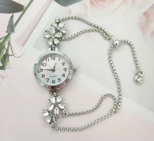 Women's bohemian rhinestone flower watch with sliding bezel MLA-T0060G - Picture 1 of 1