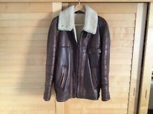BLOUSON CUIR BOMBARDIER  BOMBERS VESTE MOUTON RETOURNE TAILLE L MADE IN FRANCE .