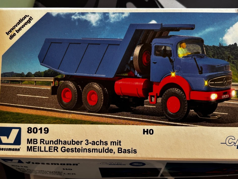 Viessmann CM 8019 MB Rundhauber 3-achs mit Meiller Gesteinsmulde 1:87(H0) - Bild 1 von 3