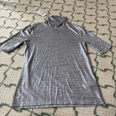Nuevo con etiquetas Top tejido Lauren Ralph Lauren plateado brillante cuello alto talla M $69,50 Foto 1 de 4