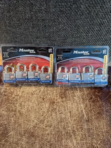 Lot of 2 - 4-Pack of Master Lock Case-Hardened Steel Padlocks Cover