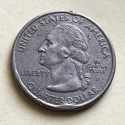 2004 D Michigan State Quarter- Struck-through Obverse - Image 1 of 4
