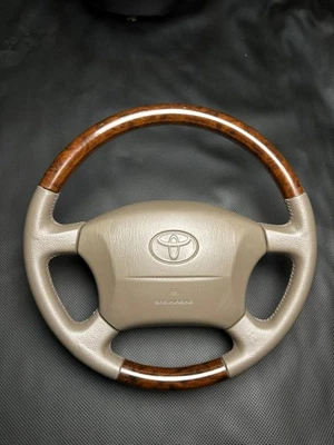Volante Toyota Land Cruiser 100 Series, Lexus LX470 couro bordado fabricante de equipamento original - Imagem 1 de 4