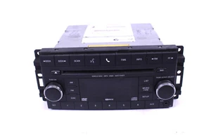 CD Autoradio Dodge Jeep Compass Chrysler Sebring 05064955 AE MP3 WMA + Codice - Foto 1 di 2