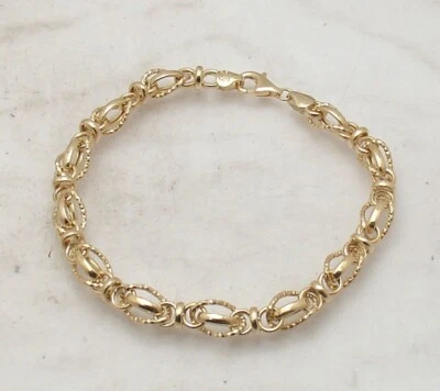 Brazalete Technibond de eslabones ovalados brillantes talla diamante chapado en oro amarillo de 14K plateado Foto 1 de 4