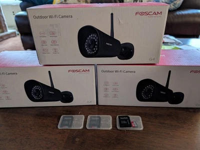 Tres cámaras exteriores FOSCAM G4 2K/4MP IP WiFi y tarjetas microSD de 32 GB Foto 1 de 3