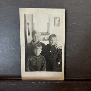 RPPC Three young boys brothers w varying haircuts incl bowl cut. Photo Postcard - Picture 1 of 2