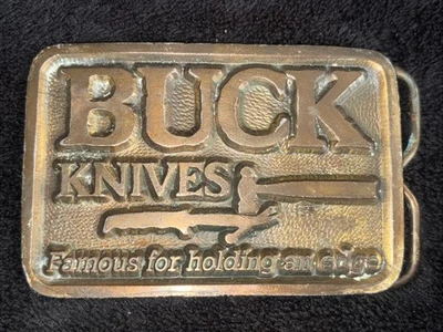 Cuchillos Buck "Famosos por sostener un borde" hebilla de cinturón de metal de colección Foto 1 de 4