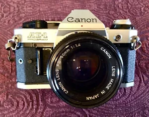 CANON AE-1 Program 35mm Film Camera w/ FD 50mm f/1.4 S.S.C Lens, JAPAN + Manual - Picture 1 of 11