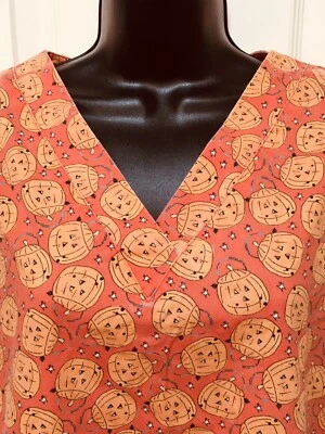 Scrubs Top Halloween Pale Orange Pumpkin Tangerine Stars UA Medium Used - Image 1 of 4
