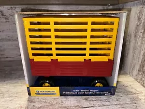 1/16 Scale New Holland Red & Yellow Bale Throw Wagon Trailer Ertl - Picture 1 of 7