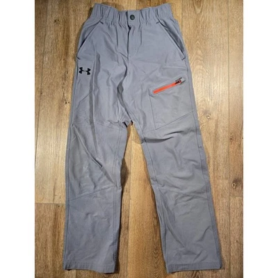 Pantalones deportivos Under Armour aislados para hombre pequeños grises calce suelto ropa deportiva Foto 1 de 4