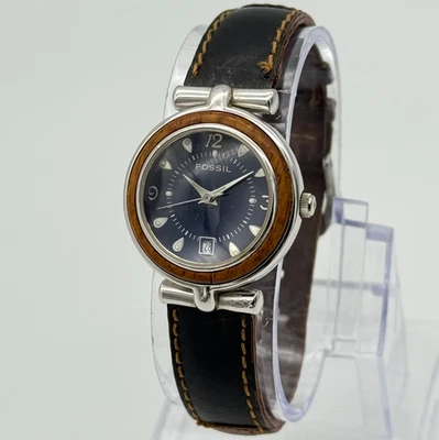 Reloj FOSSIL vintage años 90 para mujer tono plata, esfera azul, bisel de madera, EC6829 Foto 1 de 4