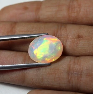 6.8 Cts 15.5x12.1 MM Natural AAA Flashy Multi Fire Ethiopian Opal Oval Cabochon - Picture 1 of 7