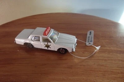 Ertl/Tomy Replica 1980 Pontiac Bonneville White Police Car Red Lights New Cond. - Image 1 of 3