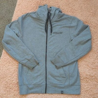 Sudadera New Era The Crown Premium Gris Imperio L Foto 1 de 4