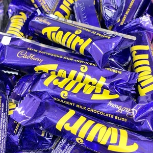 12 barras de caramelo de chocolate con leche Cadbury UK Twirl envueltas a granel 43 g - Imagen 1 de 4